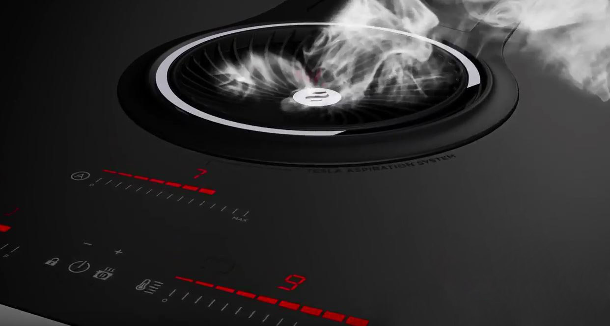 Table aspirante avec hotte intégrée